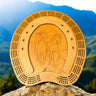 Wooden cribbage board with horse design on a rock with mountain background