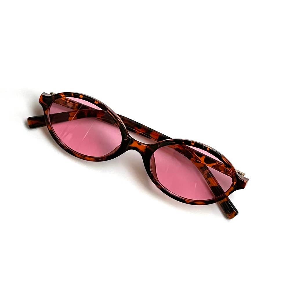 Pink tortoise framed oval sunglasses with rose lenses folded