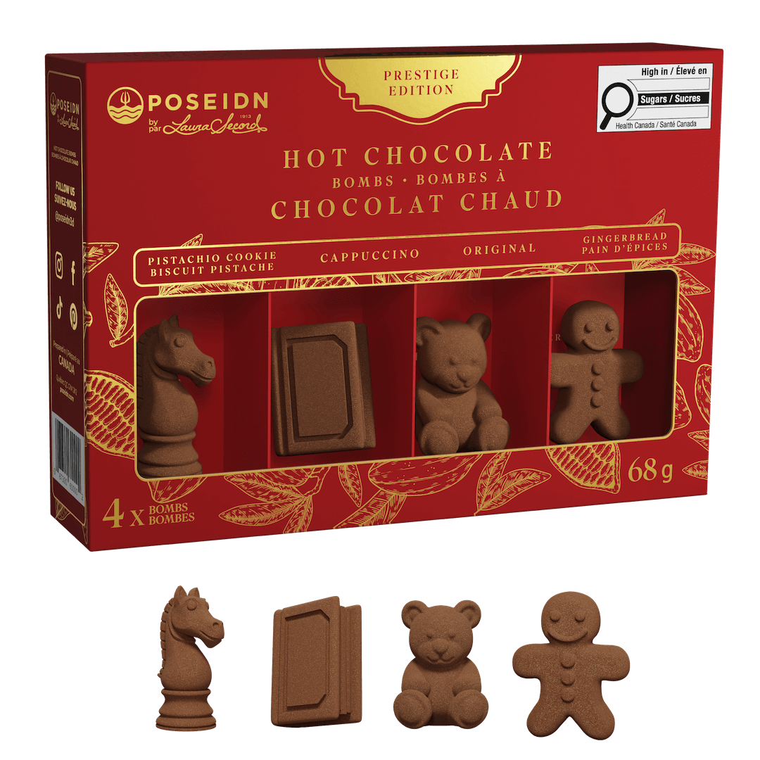 A red and gold box of Poseidon The Luxury Aesthetic Hot Chocolate Bombs, shown with four individual chocolate bombs in front on a black background. The chocolates are shaped like a chess piece, a book, a teddy bear, and a gingerbread man.