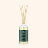 Diffuser bottle with wooden sticks on a white background