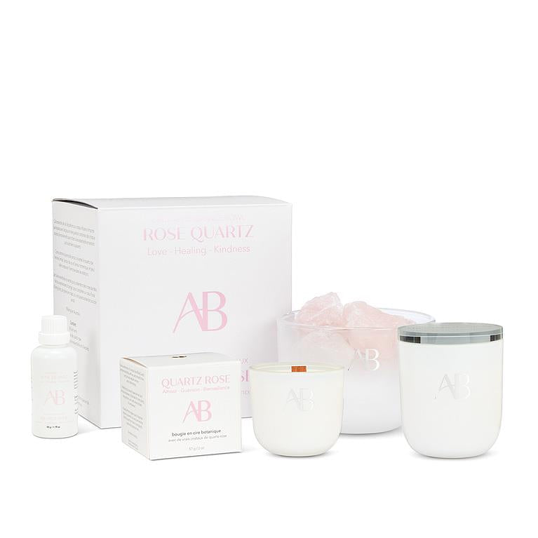 AB Rose Quartz product set including candles and packaging on a white background