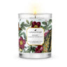 Ruby raspberry & wild mint candle in clear glass votive, featuring floral design and wooden wick for a luxurious experience.