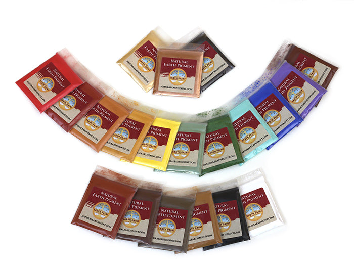 Assorted packets of Natural Earth Pigments arranged in a circular pattern on a white background.