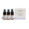 Cocoon Apothecary skin care starter kit with three bottles and a box on a white background