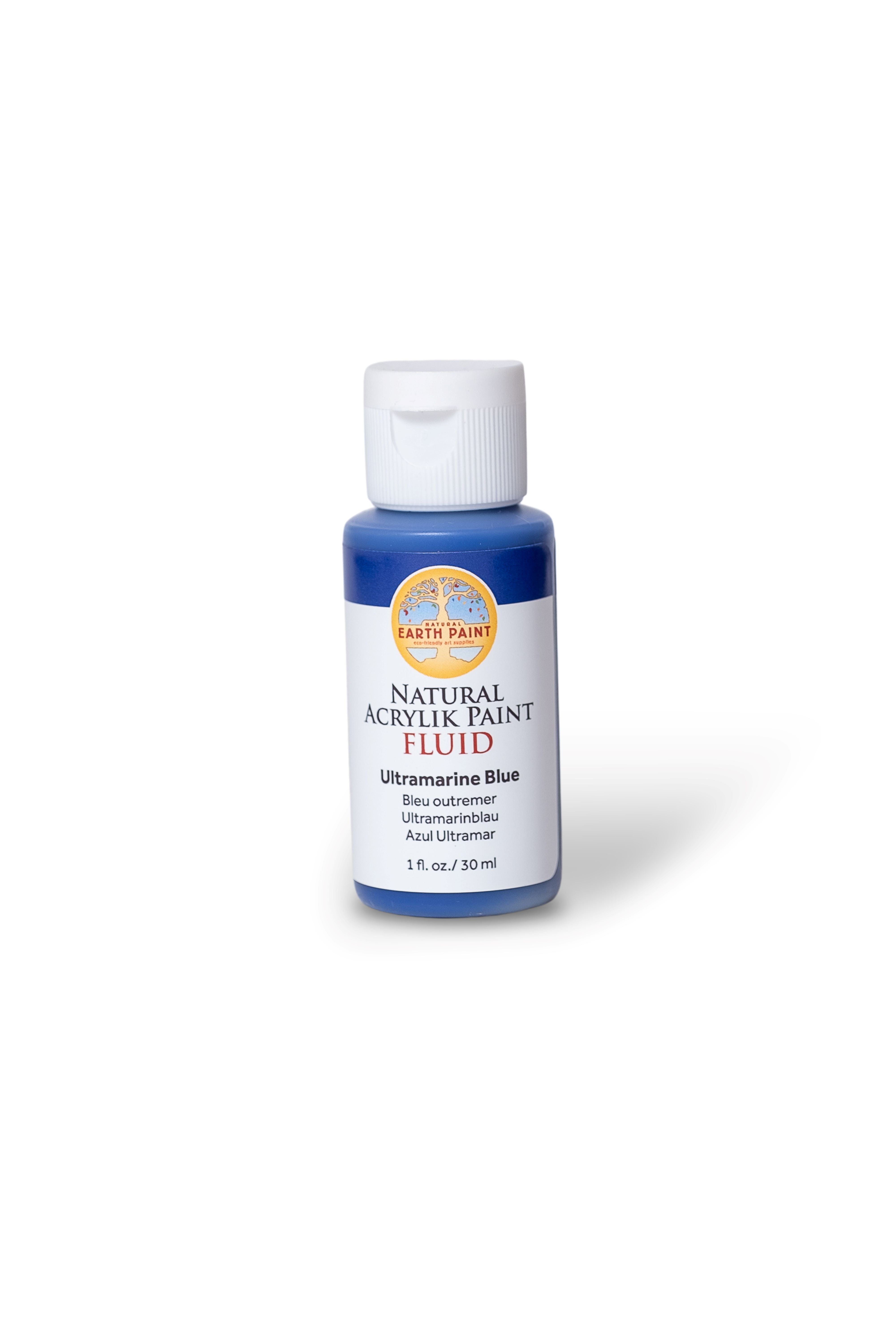 Bottle of ultramarine blue acrylic paint on a white background