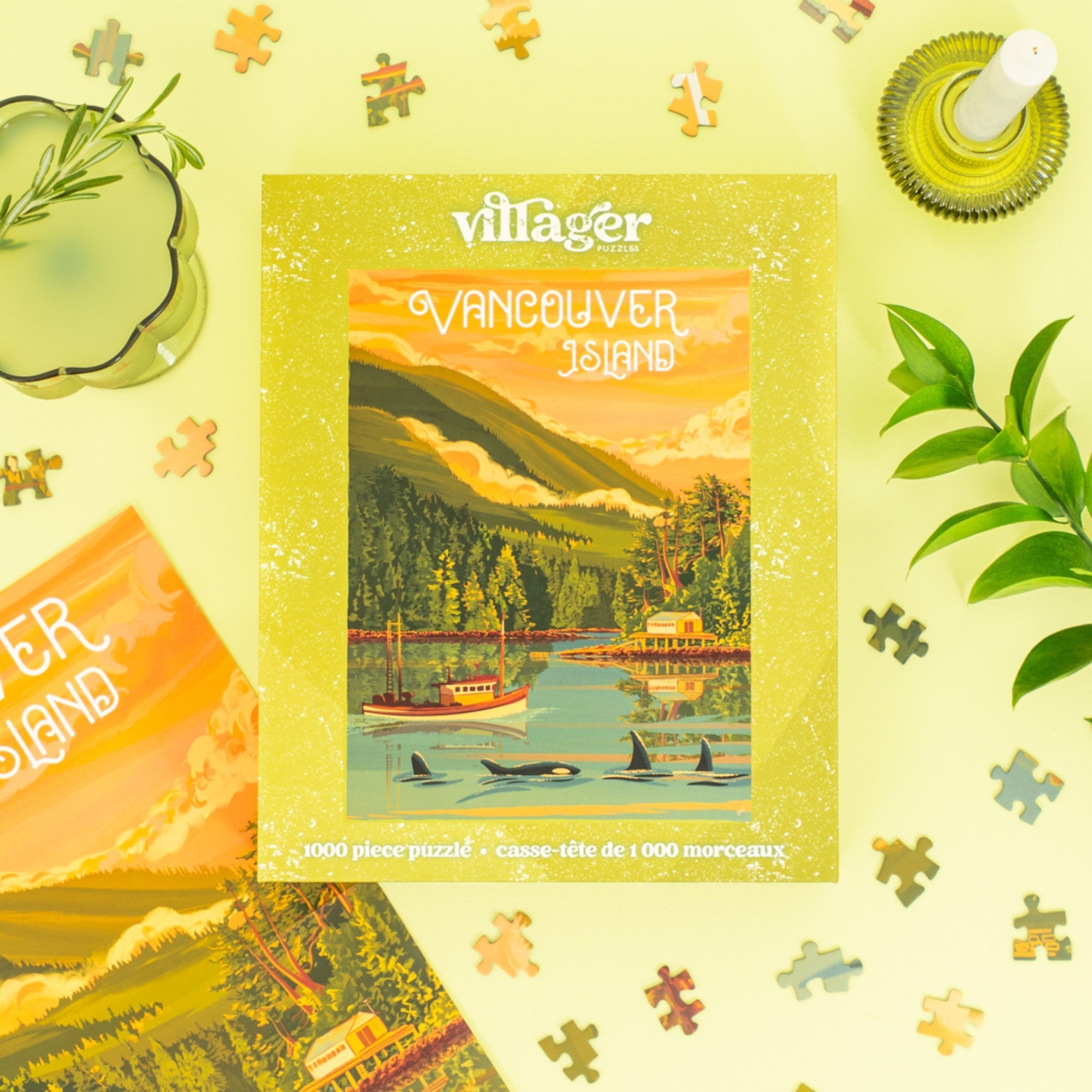 Vancouver Island-themed puzzle packaging with scenic illustration on a yellow background.