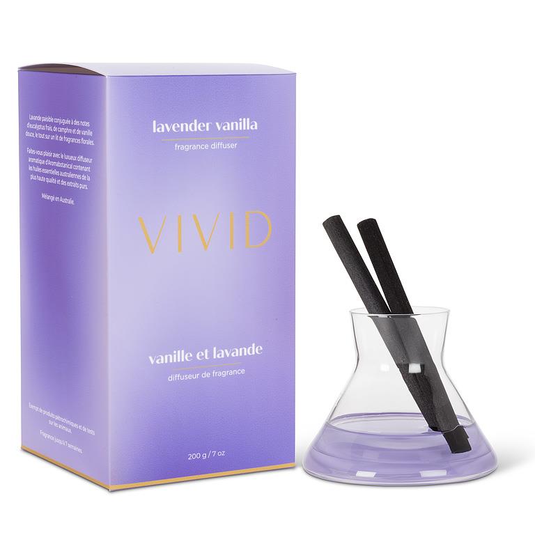 Vivid lavender vanilla fragrance diffuser with packaging on a white background