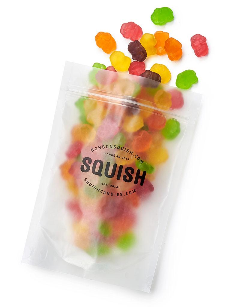 Clear bag of colorful gummy bears with 'Squish' branding on a white background