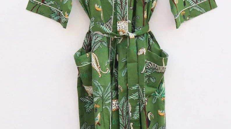 Women's Boho animal printed kimono robe made from luxurious organic cotton, featuring vibrant jungle patterns.