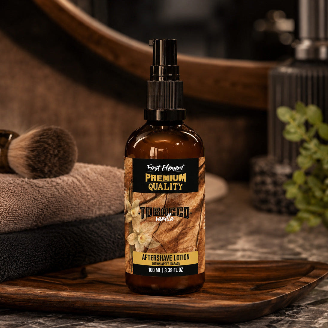 Aftershave lotion bottle labeled 'First Element Premium Quality' on a wooden tray with grooming items in the background.