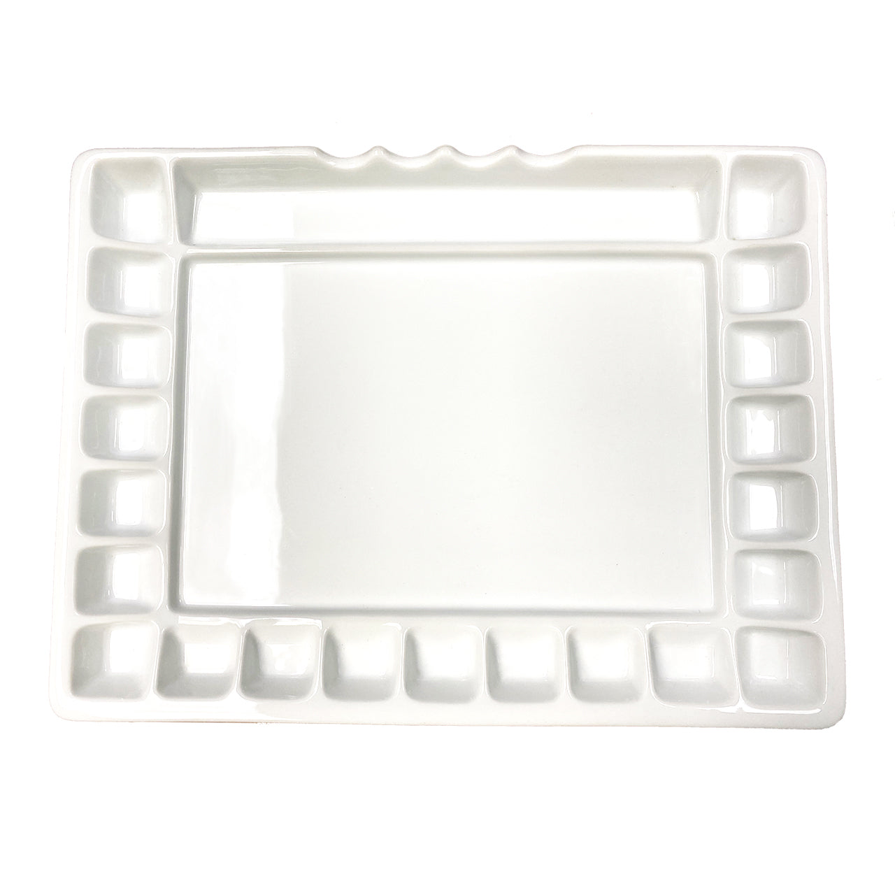 Rectangular white ceramic platter with decorative border on a white background