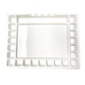 Rectangular white ceramic platter with decorative border on a white background