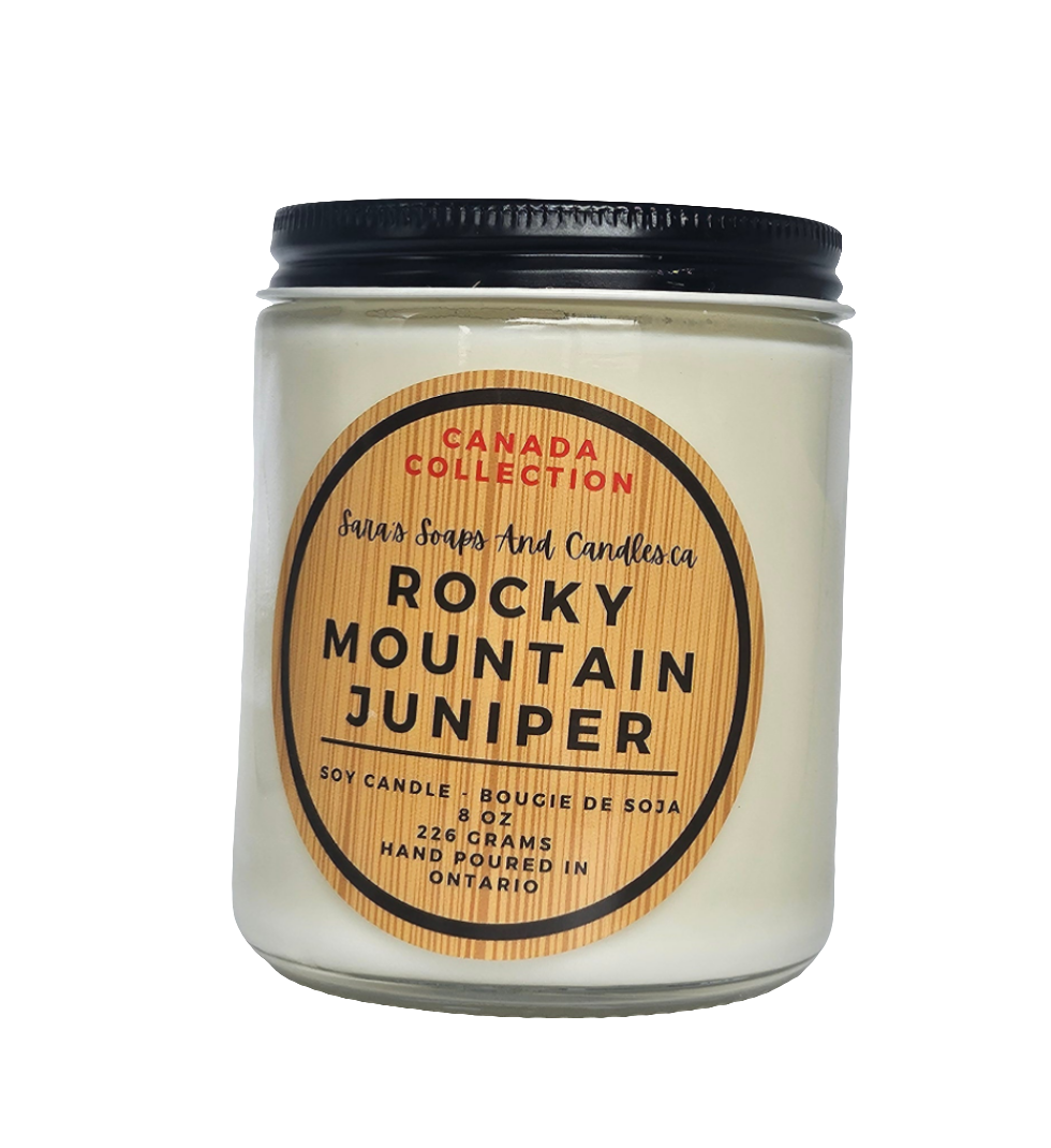 Candle jar labeled 'Rocky Mountain Juniper' from Canada Collection on a white background