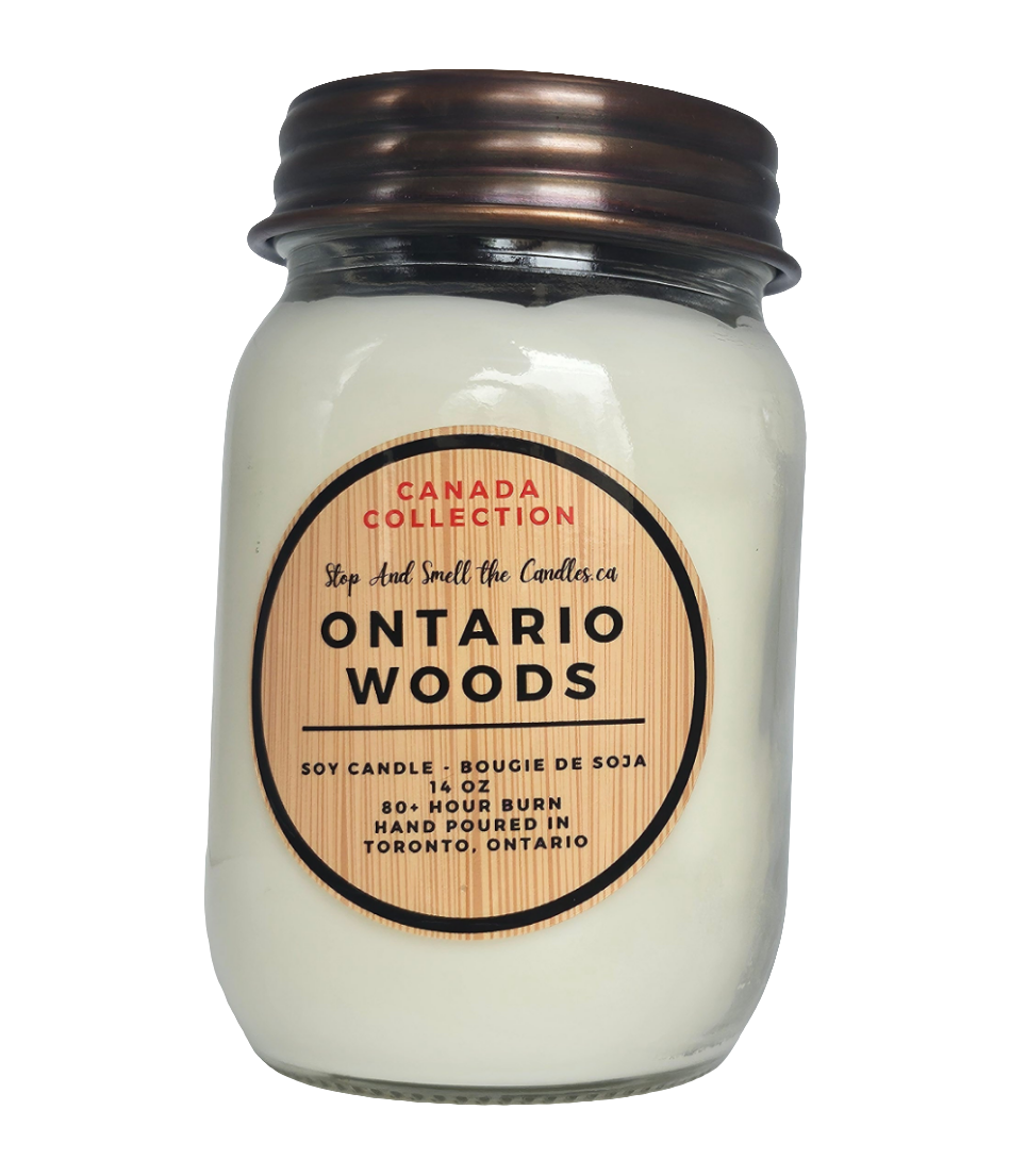 Candle jar labeled 'Ontario Woods' from the Canada Collection on a white background
