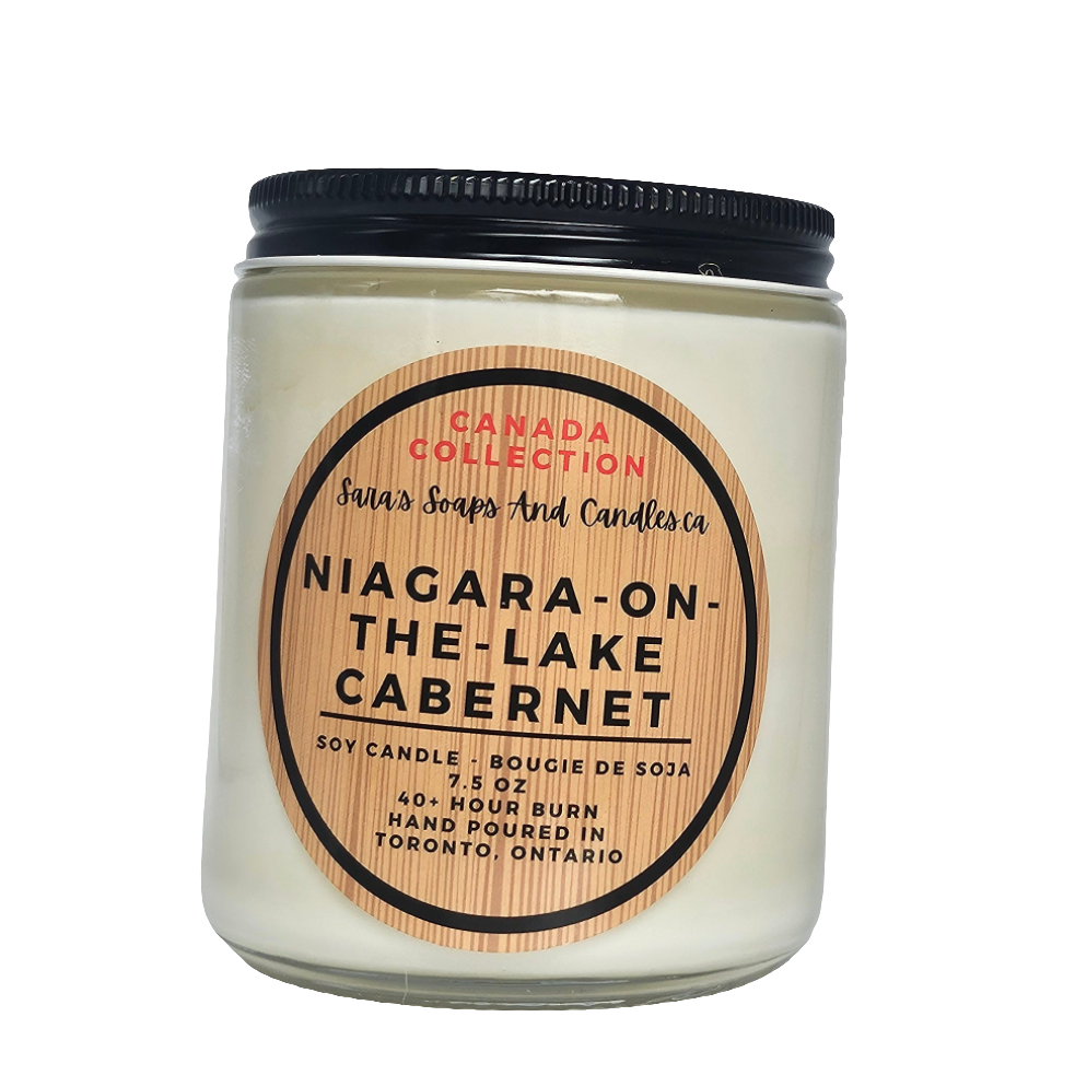 Candle jar with 'Niagara-on-the-Lake Cabernet' label on a white background