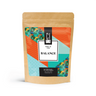 Tea package with colorful label on a white background