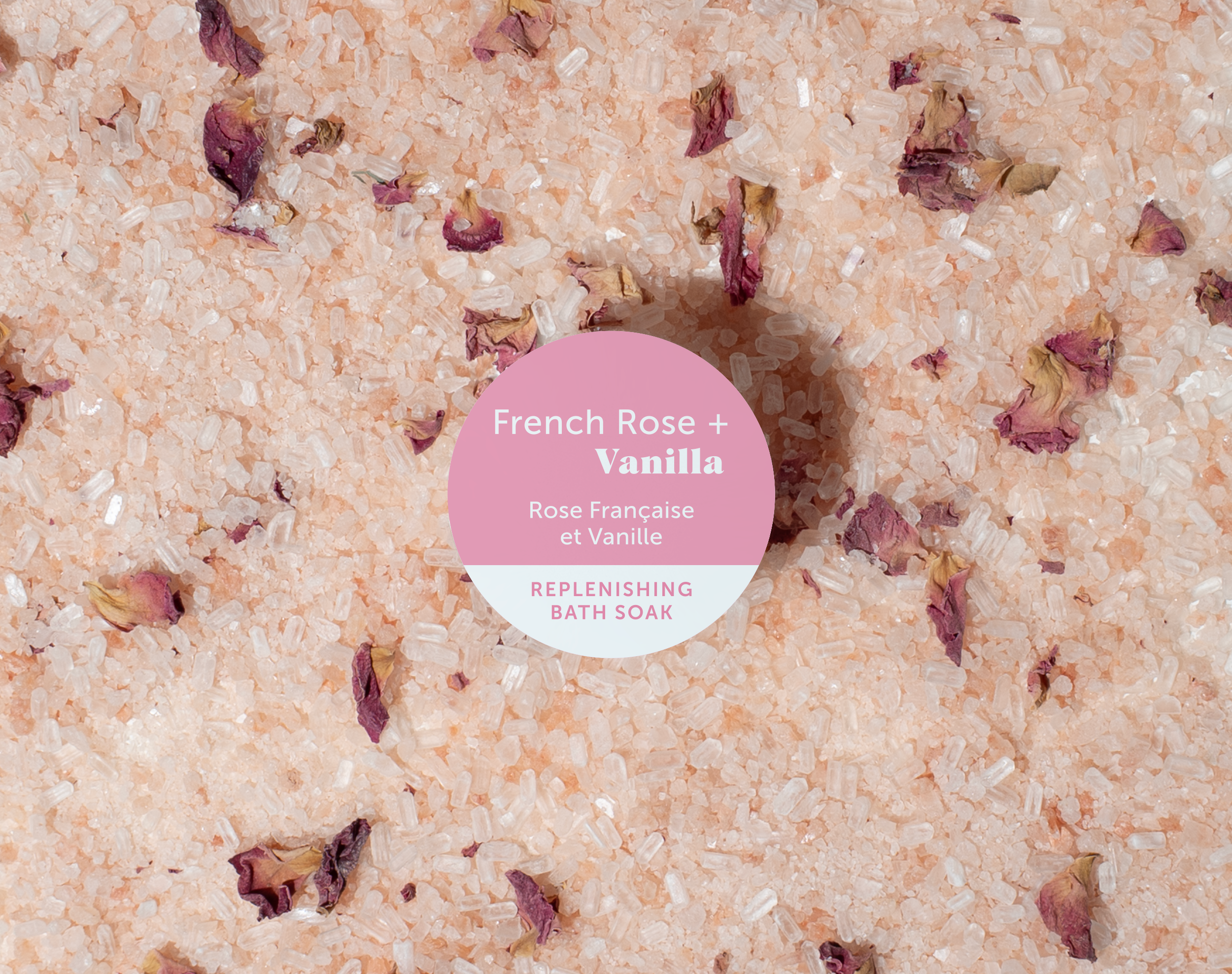 Bath salt with rose petals and a pink label on top
