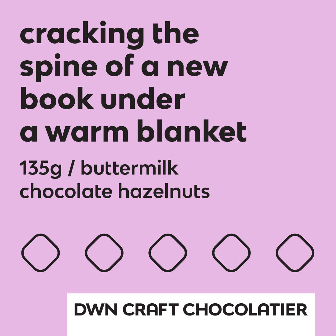 Text on a pink background with chocolate product details and DWN Craft Chocolatier branding.