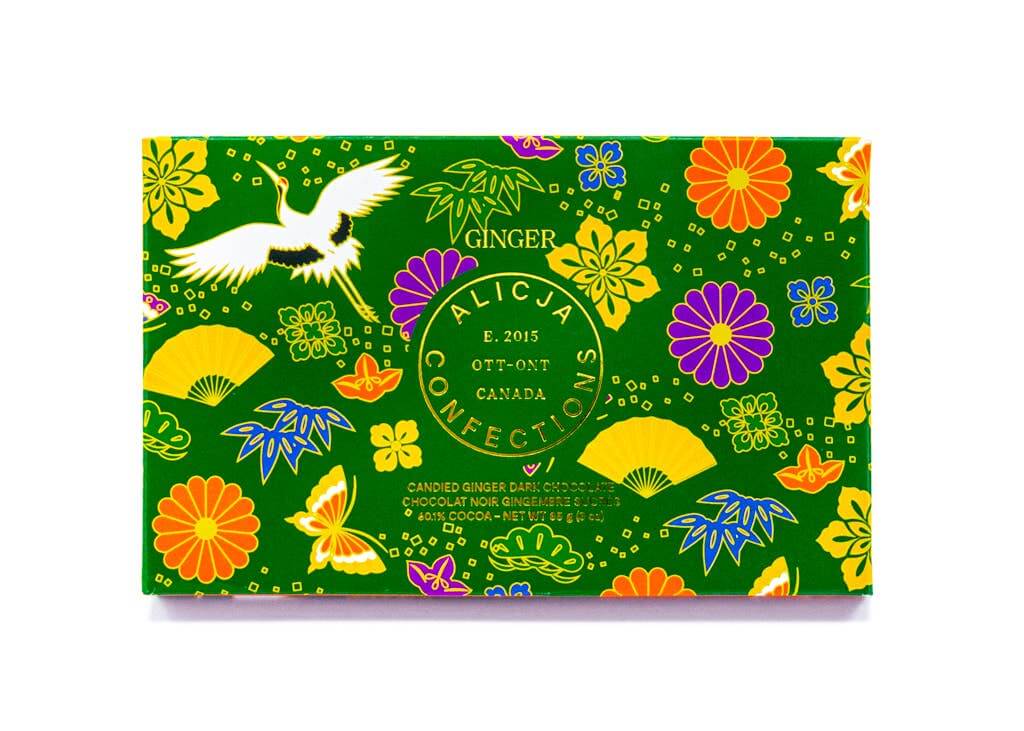 Ginger Vegan Dark Chocolate Bar 60.1% cocoa with candied ginger, colorful floral packaging, 85g net weight.