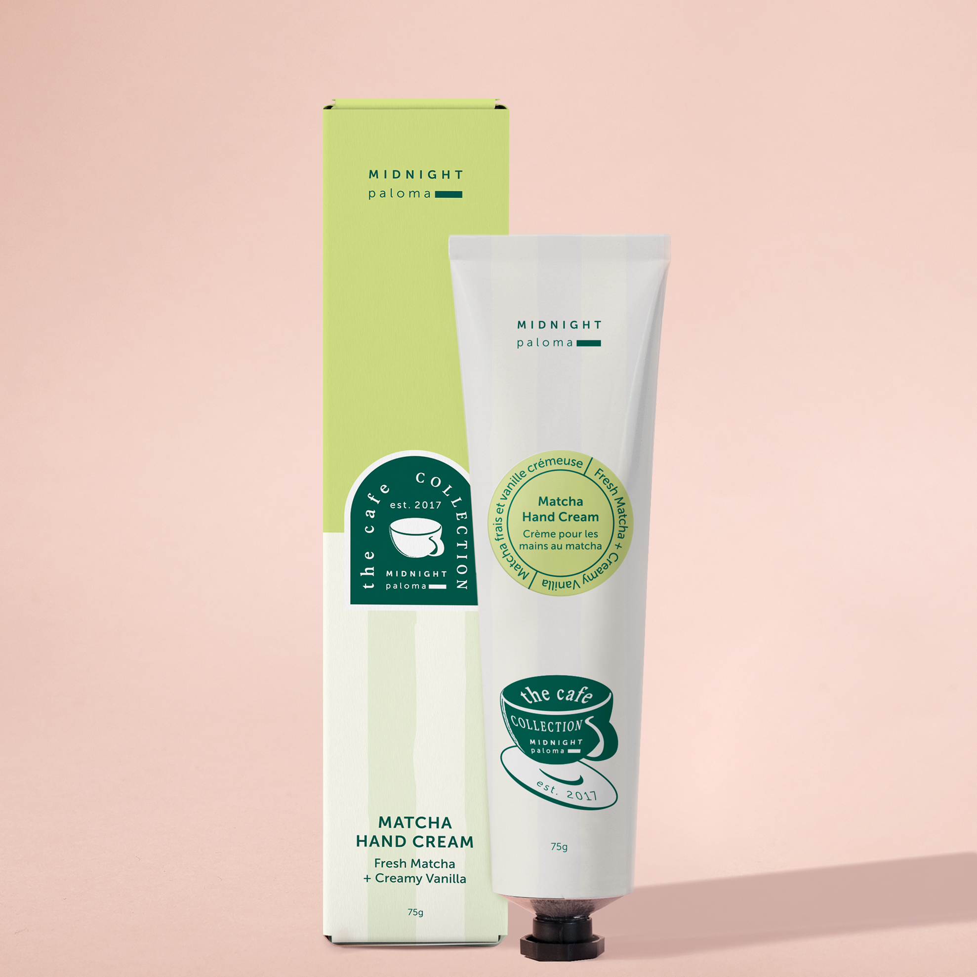 Matcha hand cream with packaging on a pink background