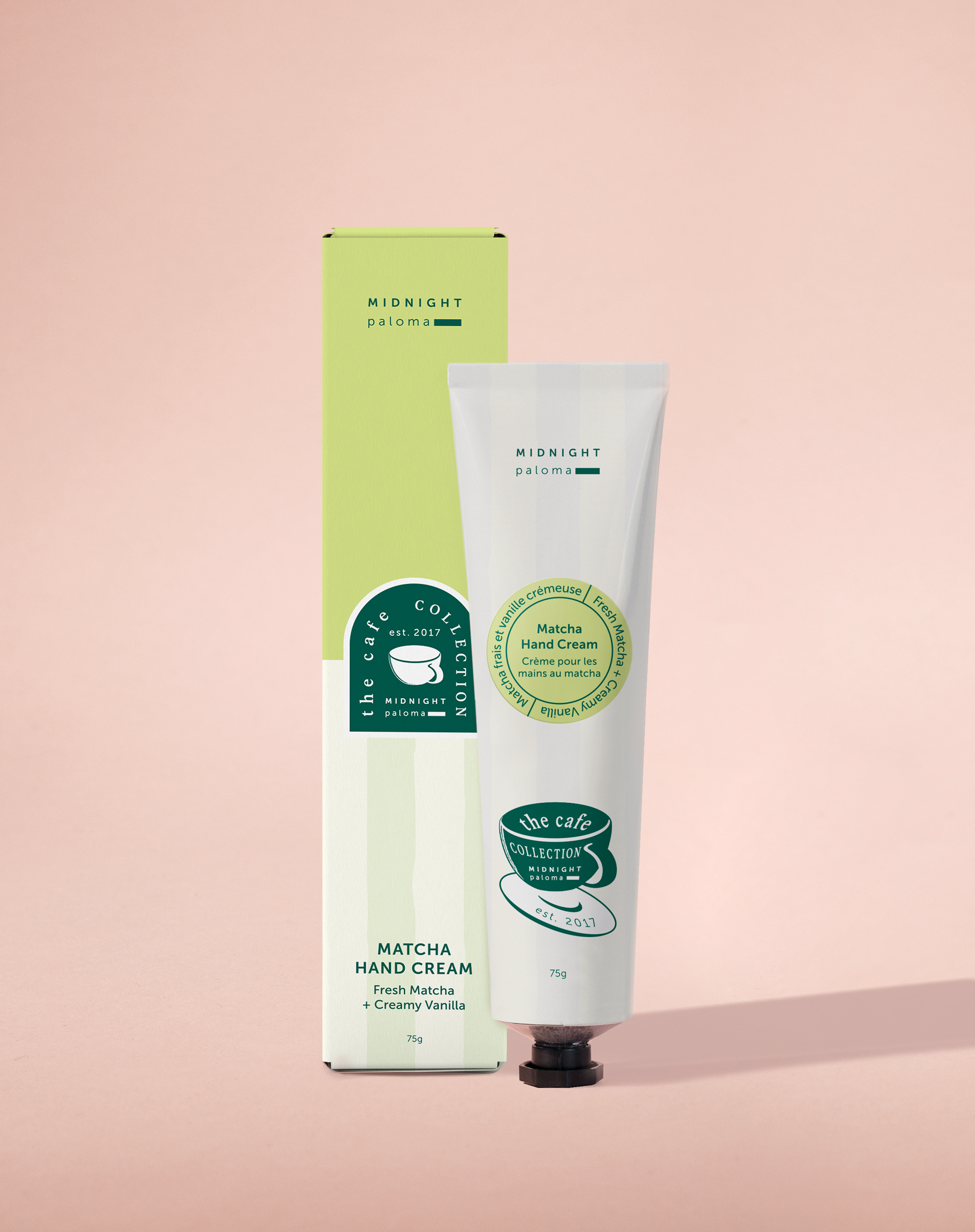 Matcha hand cream with packaging on a pink background