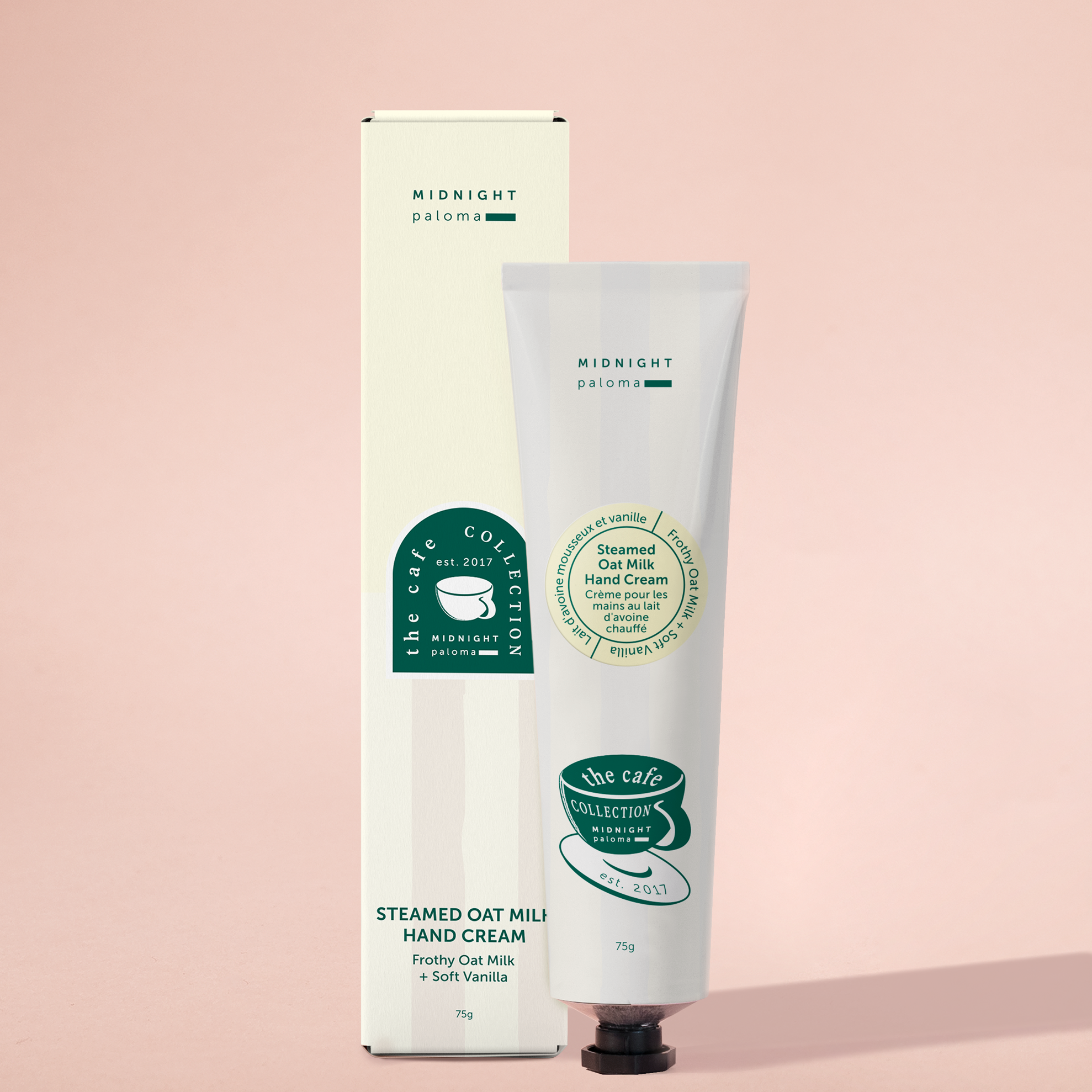 Hand cream tube and packaging on a pink background
