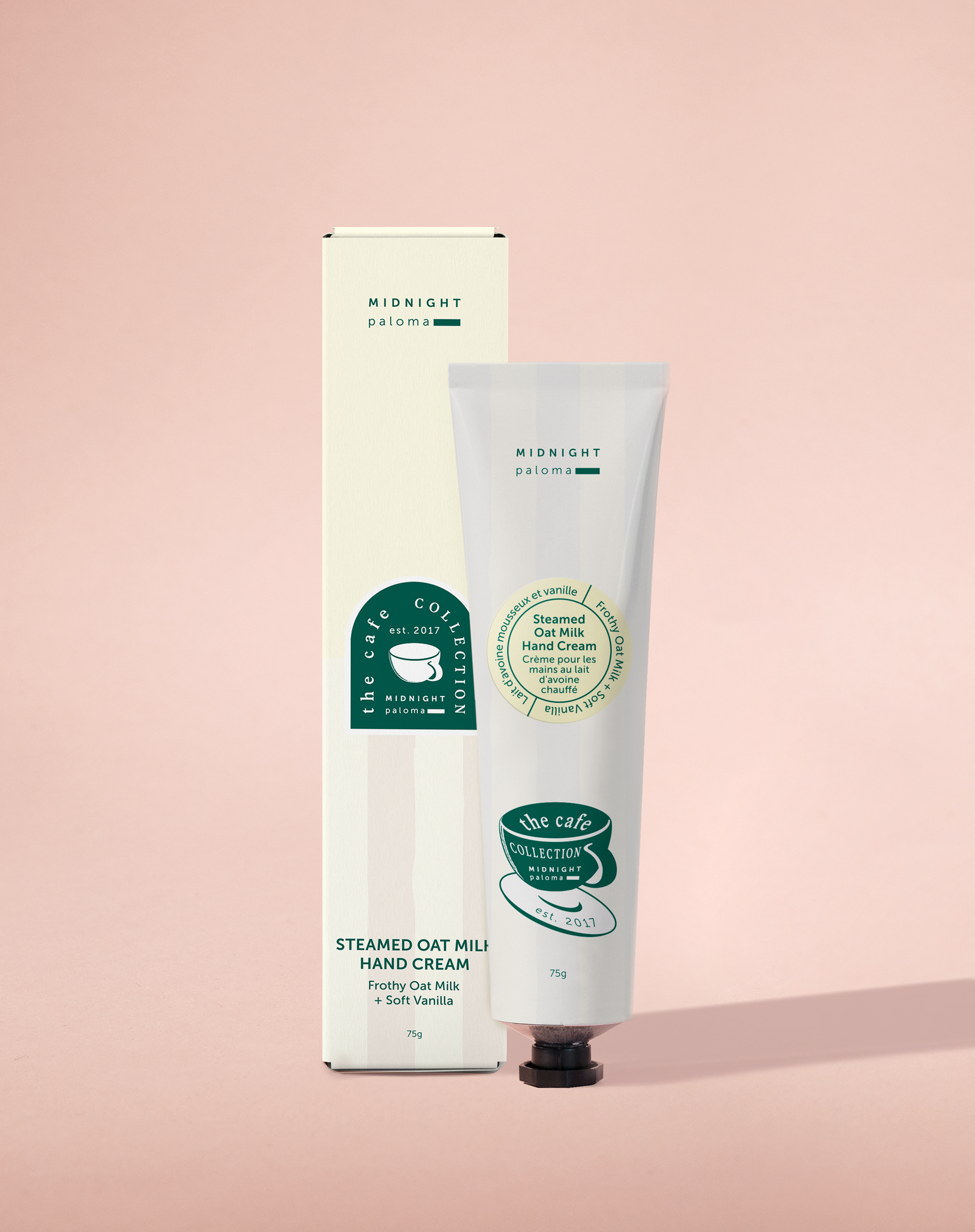 Hand cream tube and packaging on a pink background
