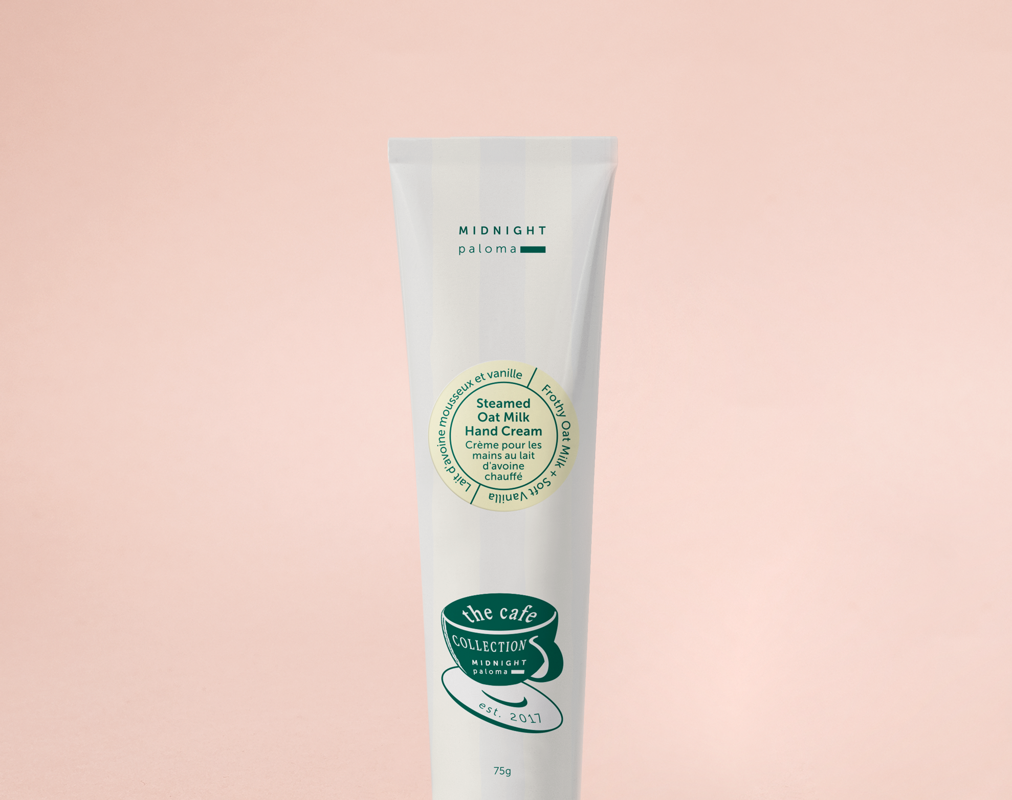 Hand cream tube on a pink background