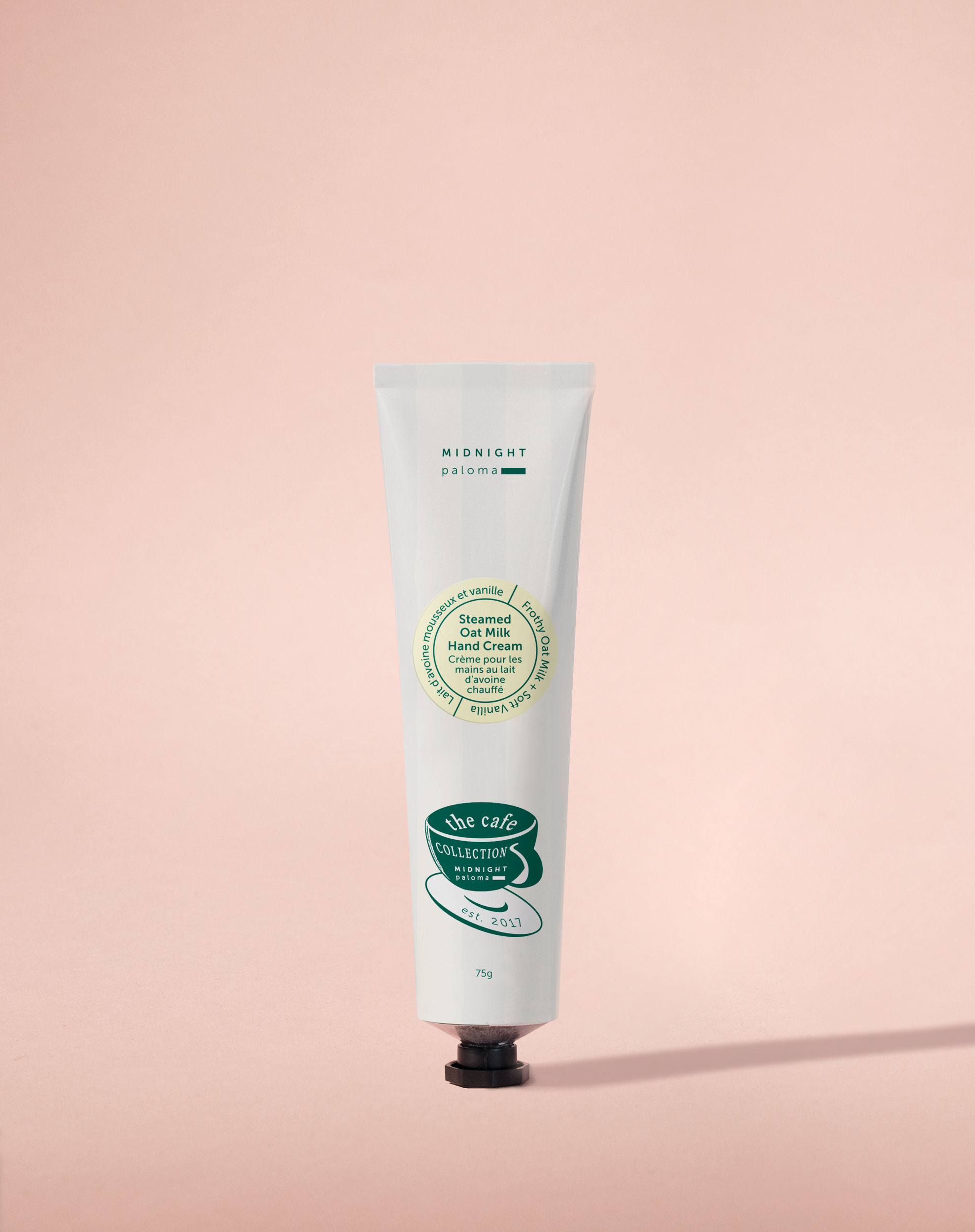 Hand cream tube on a pink background
