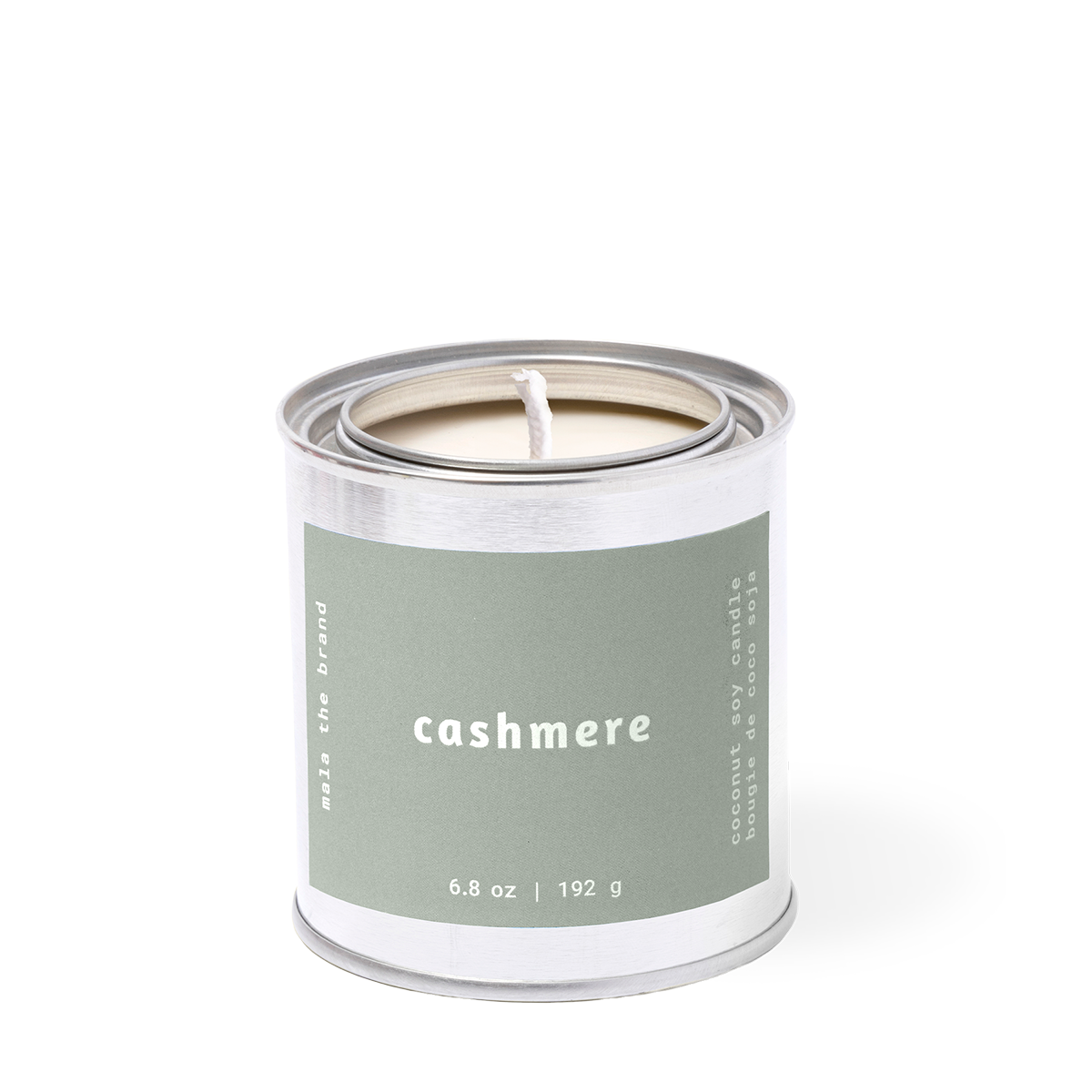 Candle in a metal canister labeled 'cashmere' on a white background