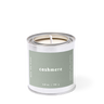 Candle in a metal canister labeled 'cashmere' on a white background