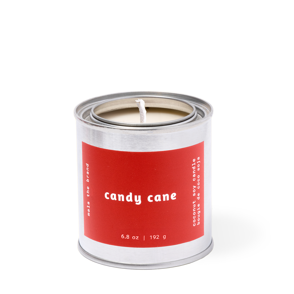 Candle in a tin labeled 'candy cane' on a white background