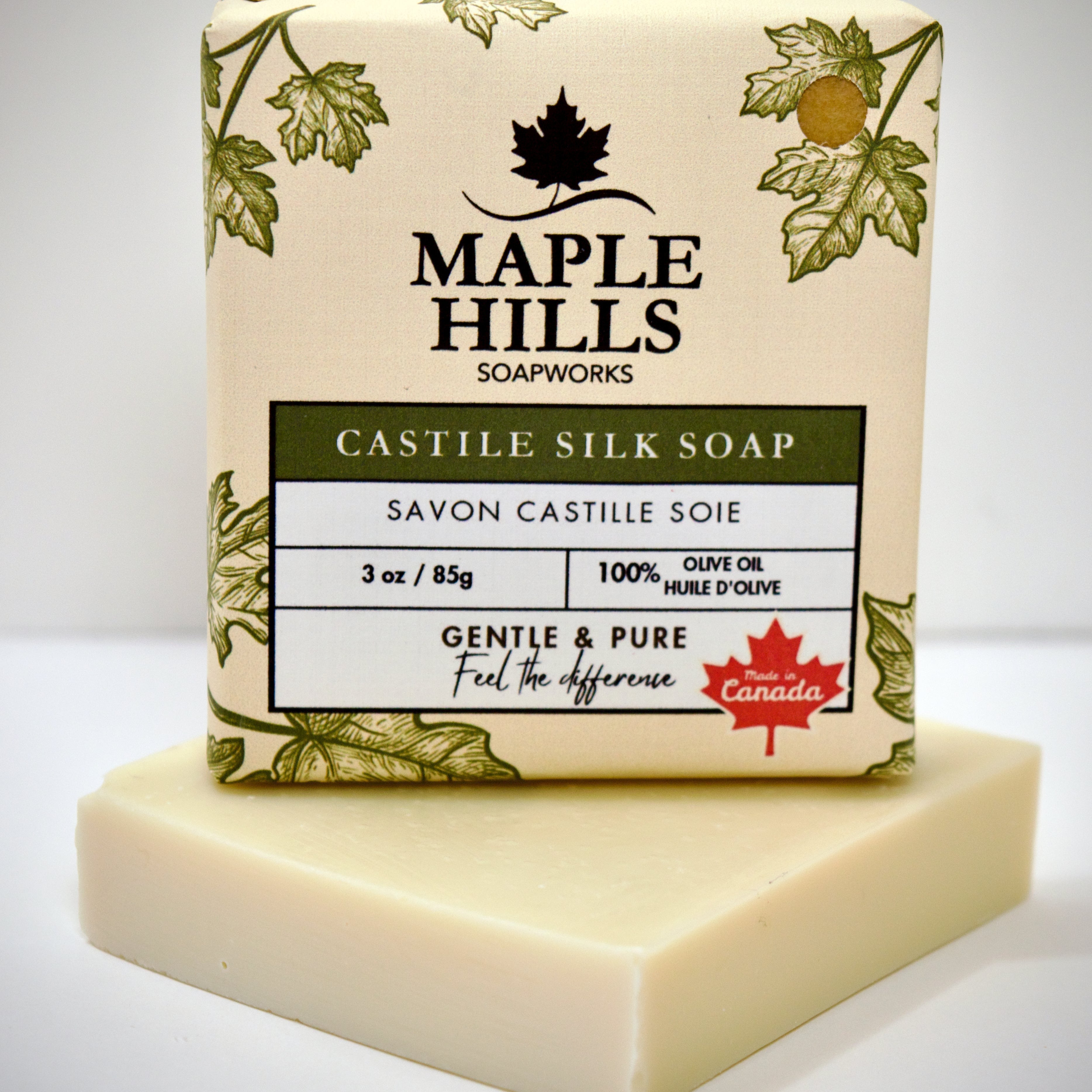 Bar of soap with 'Maple Hills Soapworks' packaging on a white background
