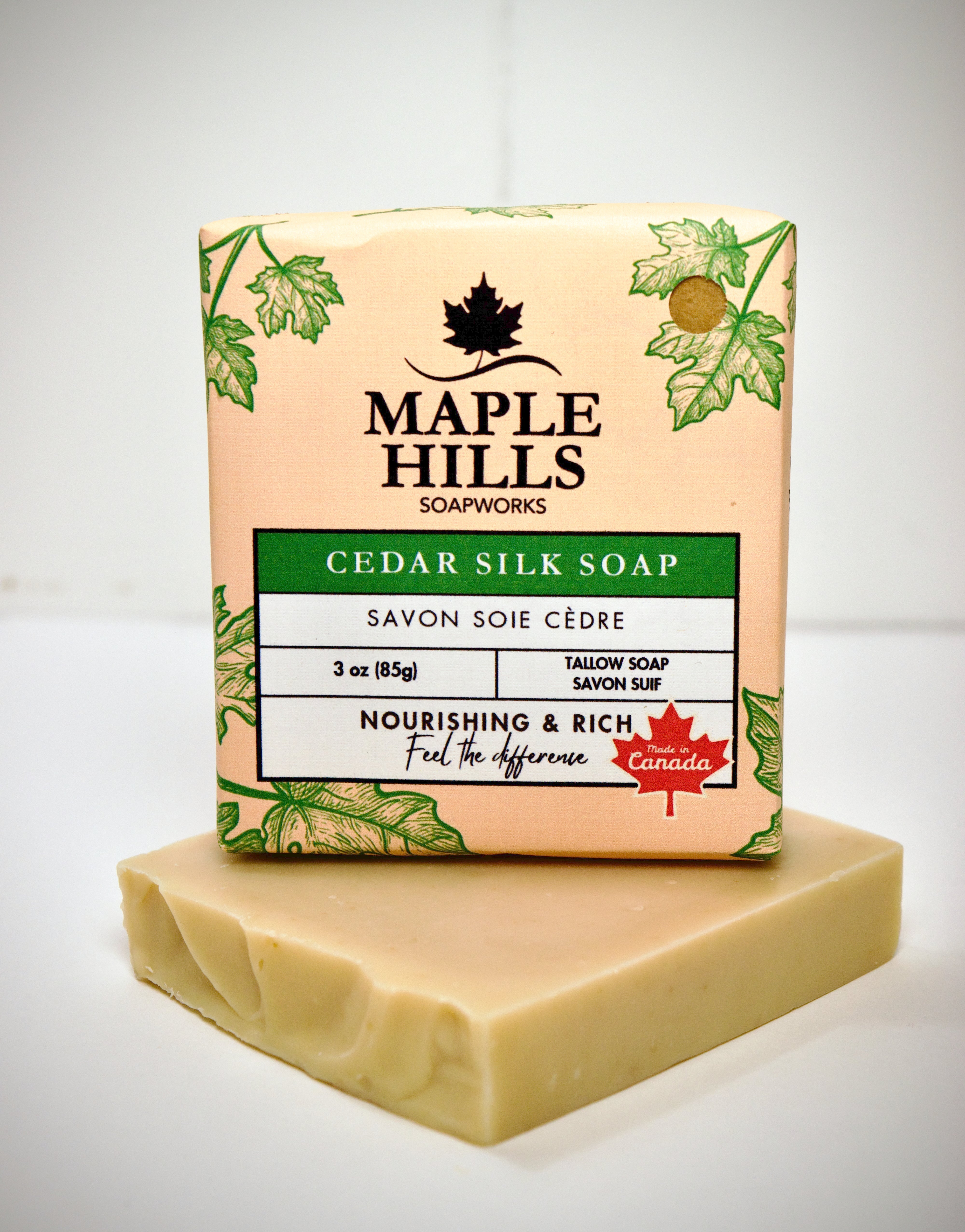 Bar of soap with Maple Hills Soapworks packaging on a white background