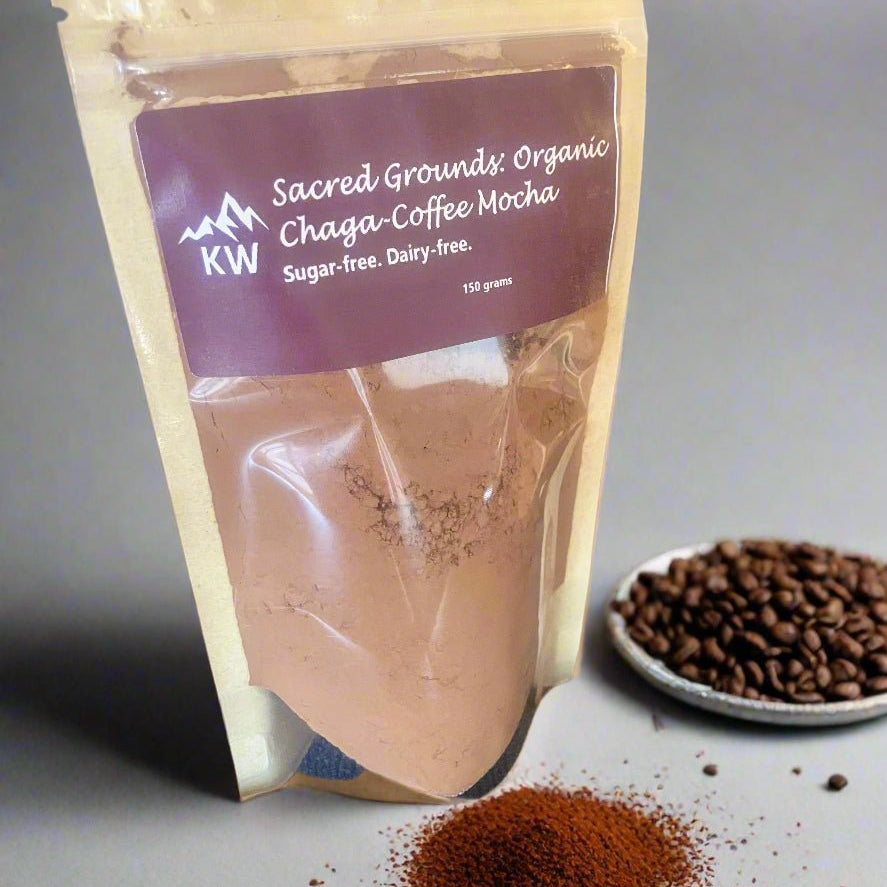 Sacred Grounds Organic Chaga-Coffee Mocha package with coffee beans and ground coffee on a gray background