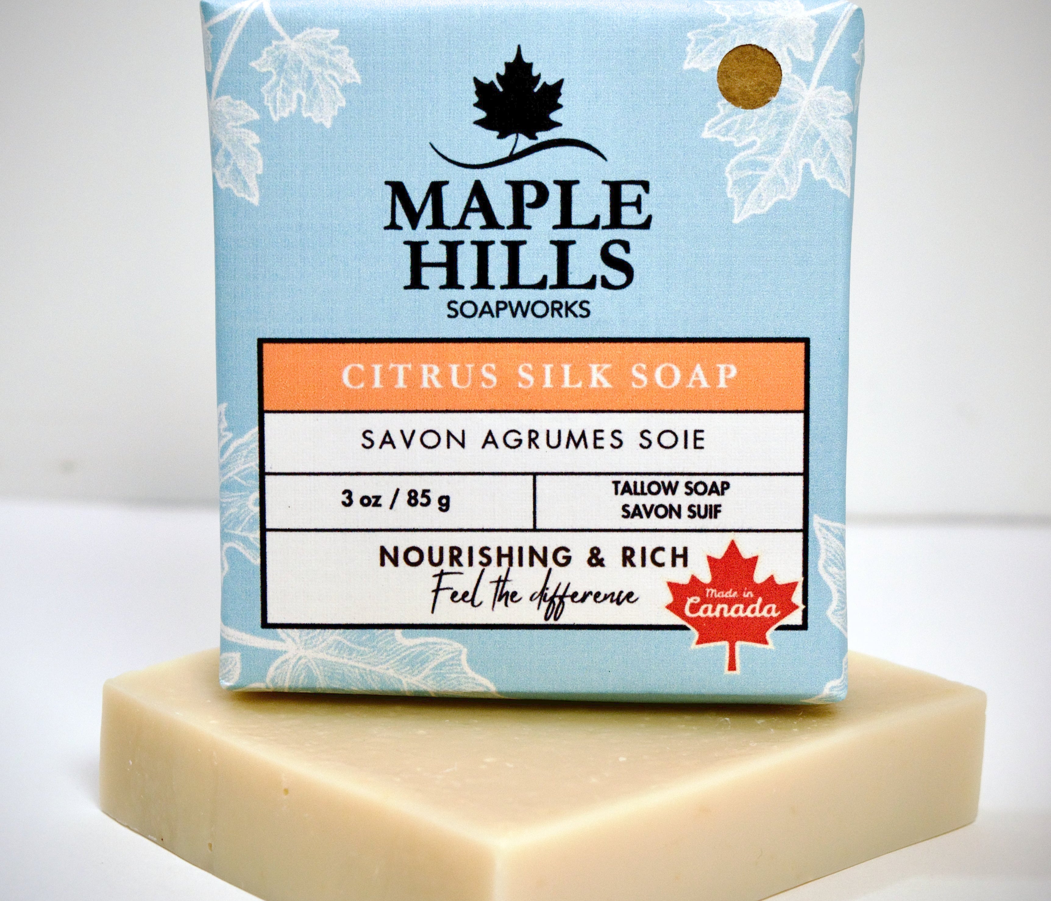 Maple Hills Soapworks soap bar with packaging on a light gray background