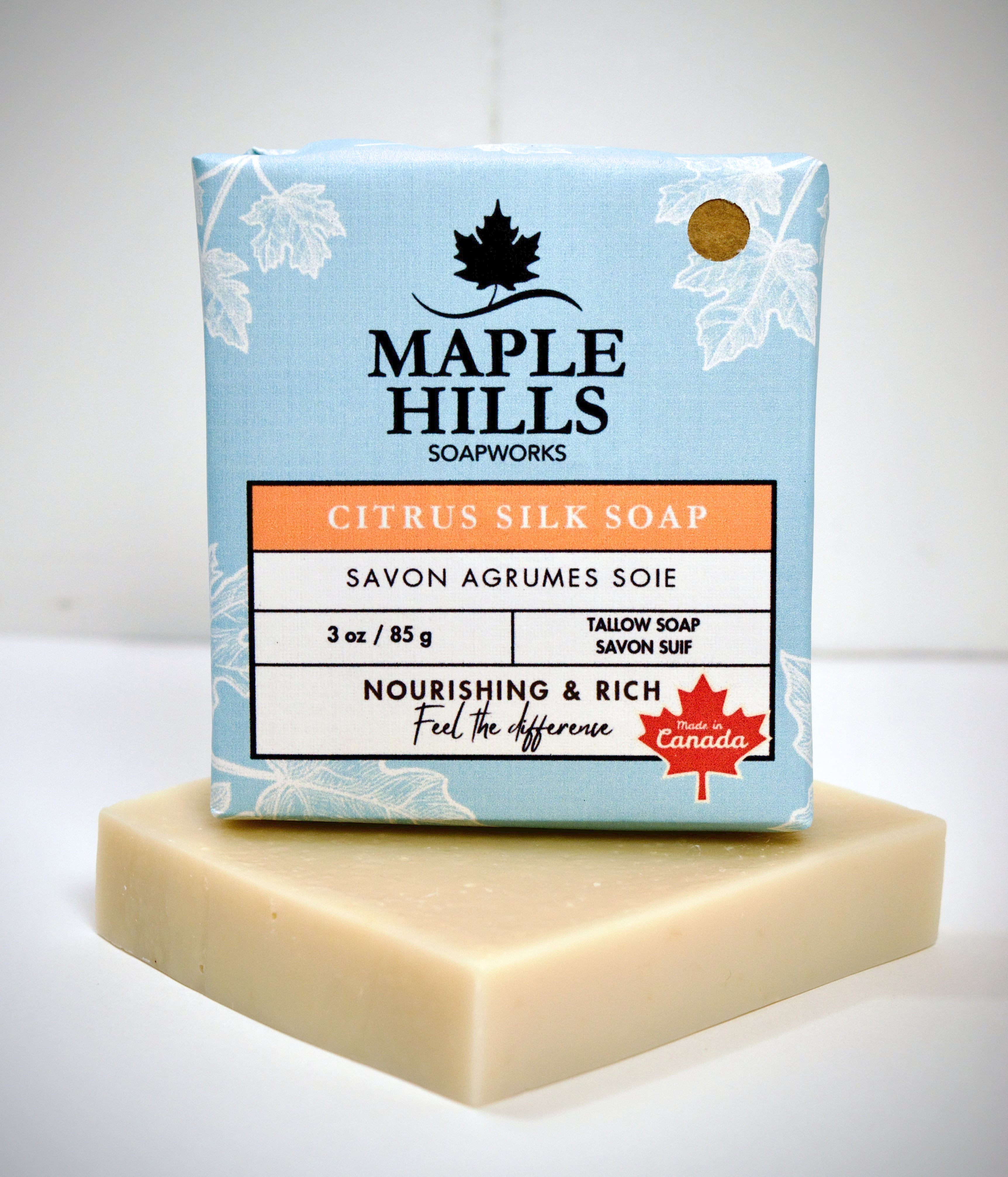 Maple Hills Soapworks soap bar with packaging on a light gray background