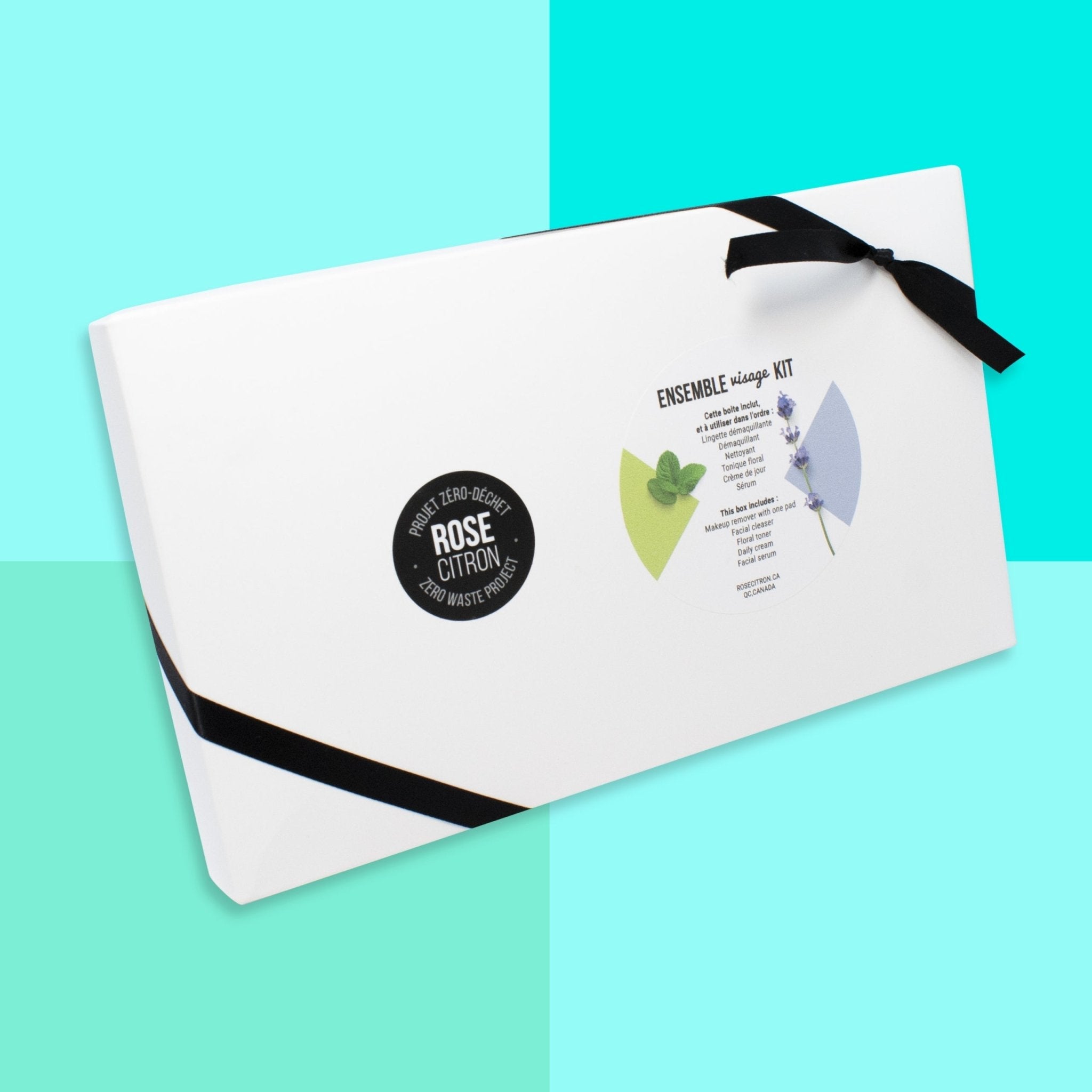 White pouch with black ribbon on a two-tone blue background