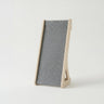 Gray felt board with wooden frame on a white background