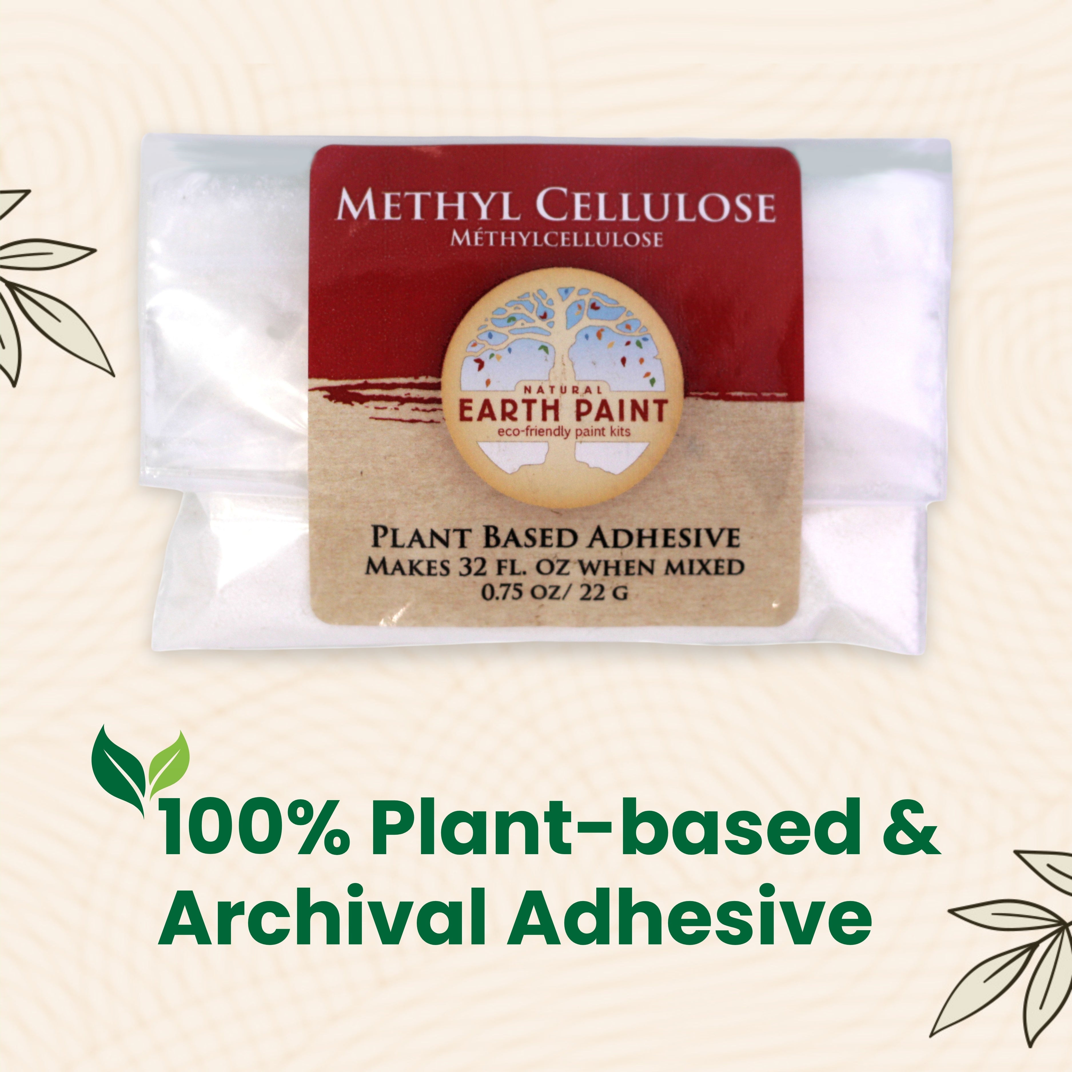 Packaged plant-based adhesive with Earth Paint branding on a beige background
