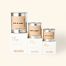 Three 'milk & sugar' containers with labels on a white background