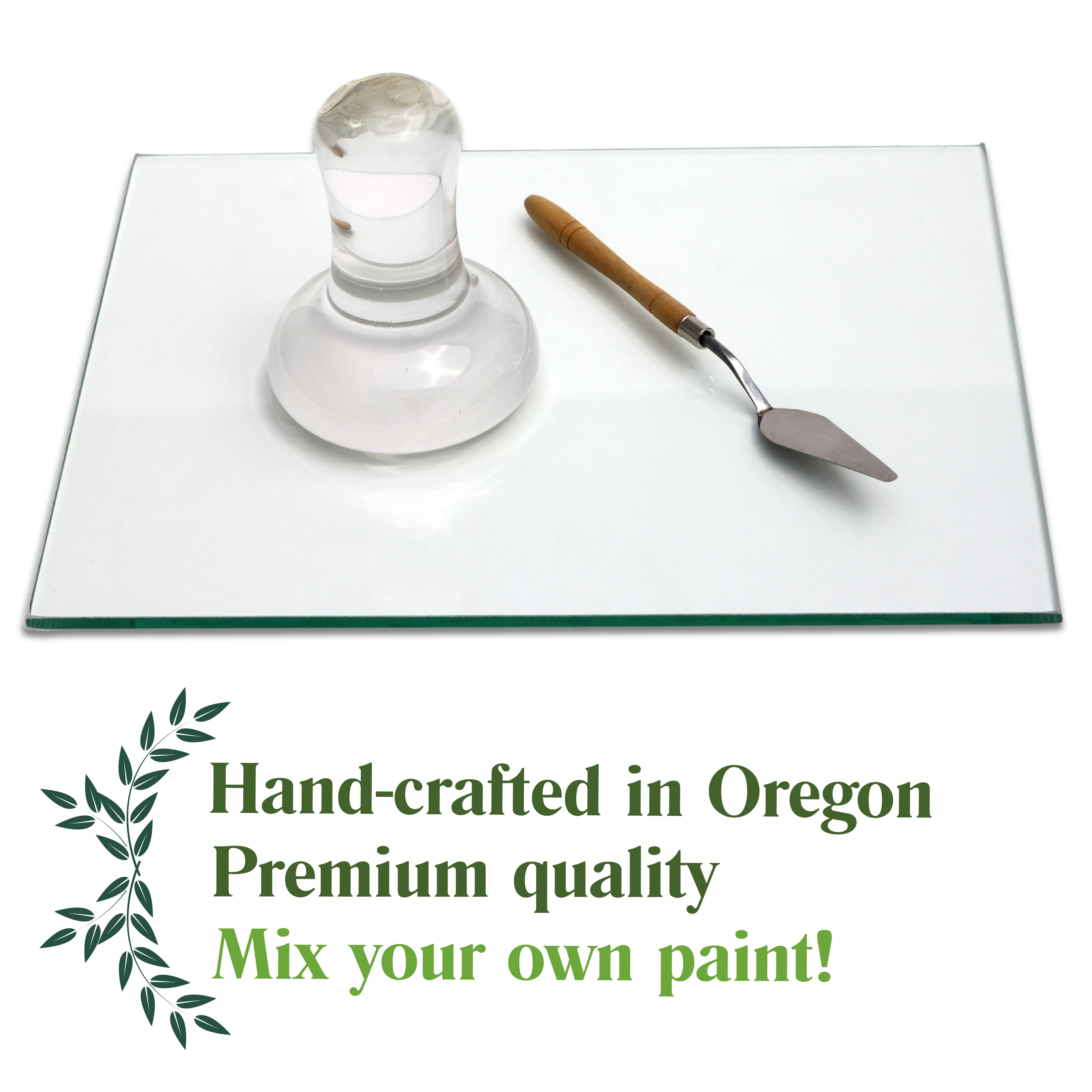 Clear Glass Paint Muller with a spatula on a white surface, labeled 'Hand-crafted in Oregon Premium quality Mix your own paint!'.