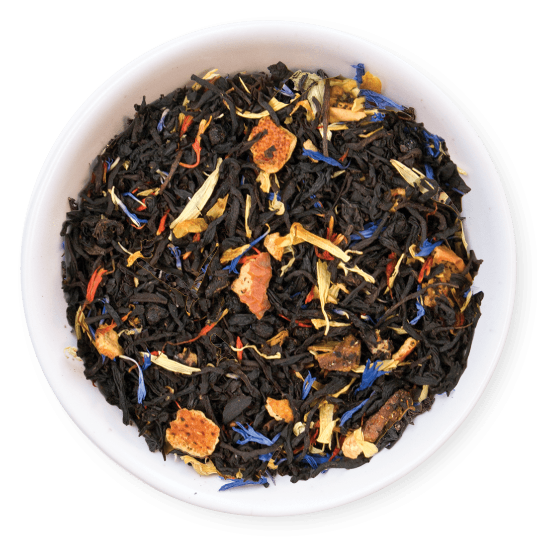 Tea leaves with visible colors in a white bowl