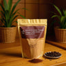 Sacred Grounds Organic Chaga Coffee Mocha package on a wooden surface with coffee beans and plants in the background.