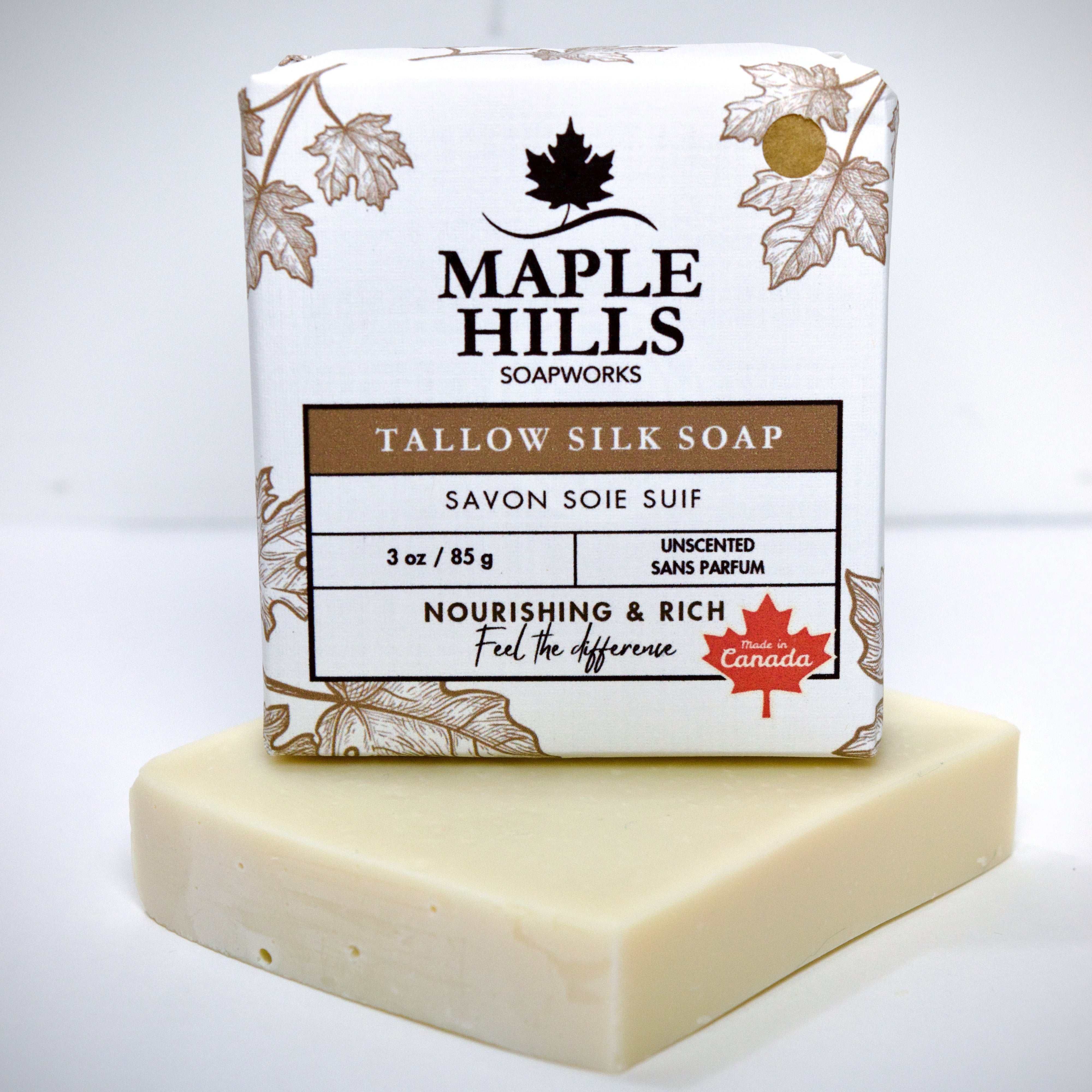 Bar of soap with Maple Hills Soapworks packaging on a white background
