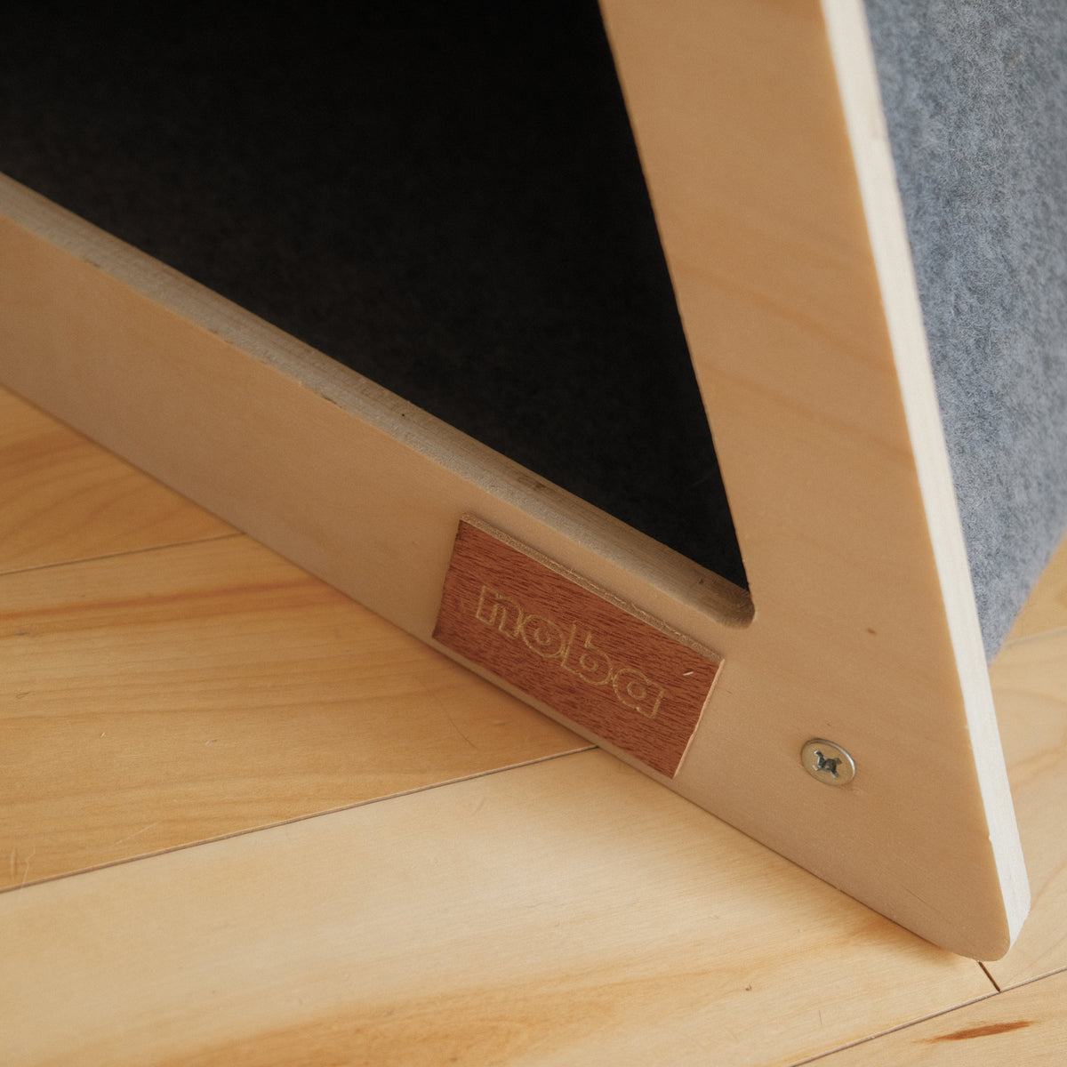 Wooden product with a brand label on a wooden surface