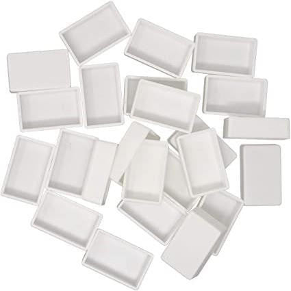 Collection of white rectangular tiles on a white background