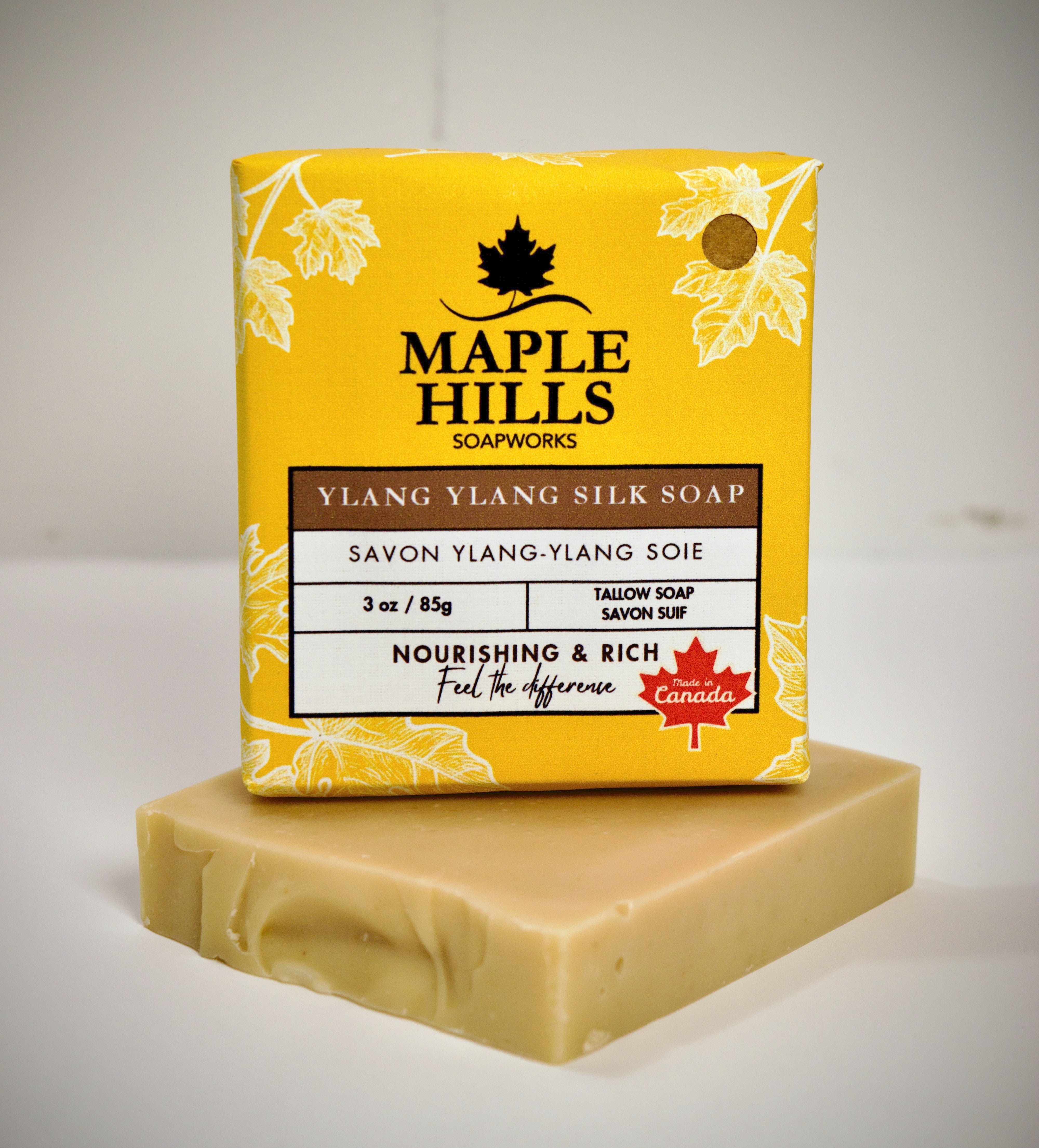Bar of soap with Maple Hills Soapworks packaging on a white background