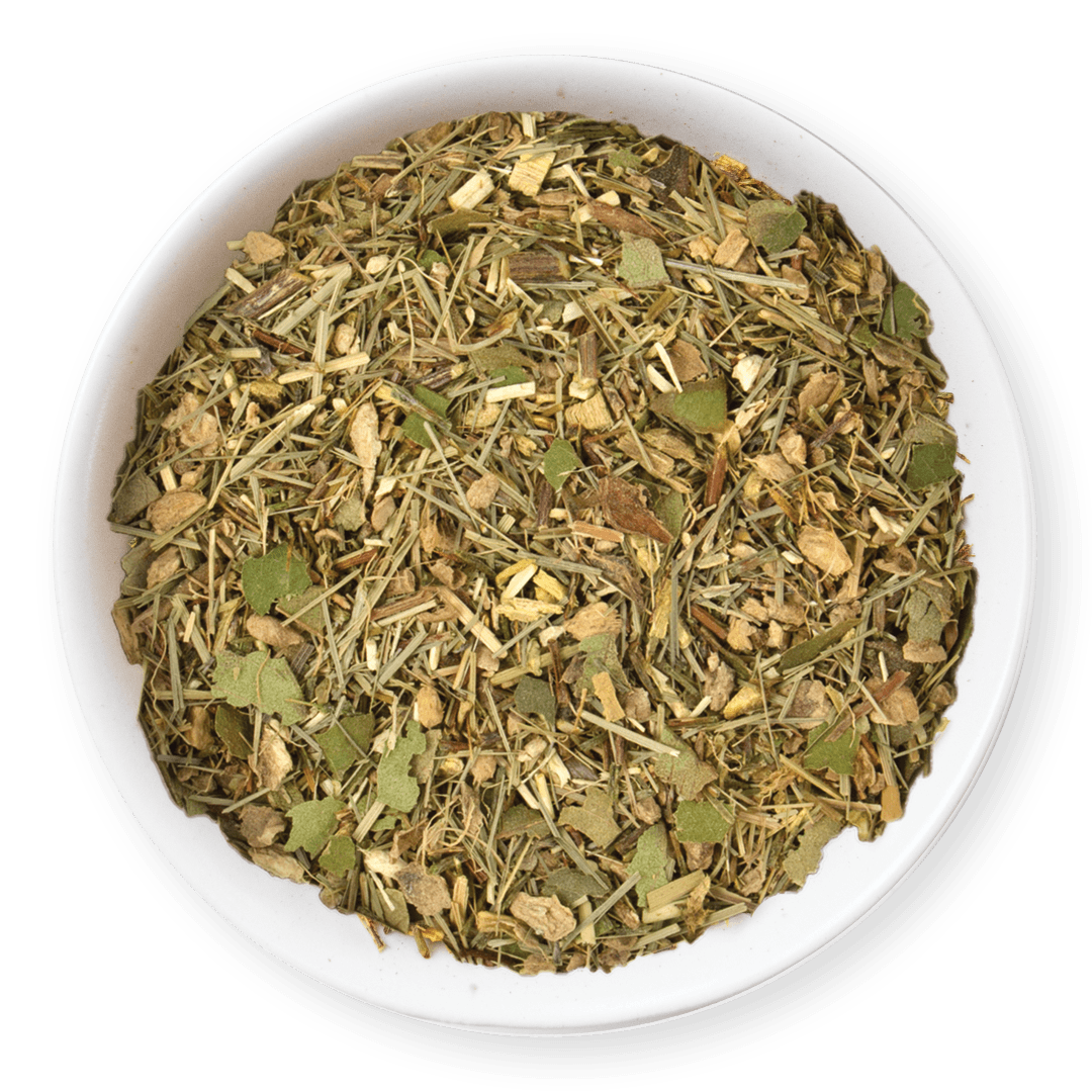 Tealish_Zesty_Ginger_Tea_Lifestyle Dry herbs in a white bowl on a dark background